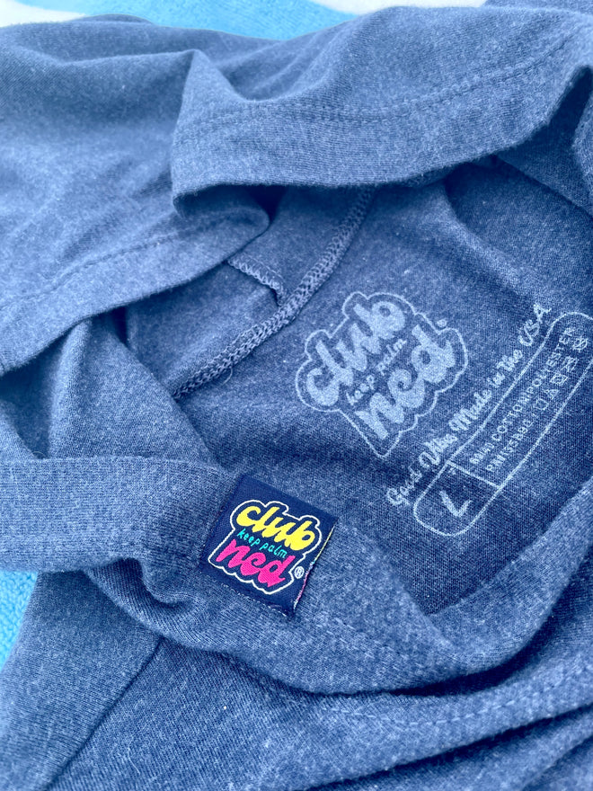 Load image into Gallery viewer, Distressed Icon Logo Hoodie- view of woven tag on hood and custom tagless label 
